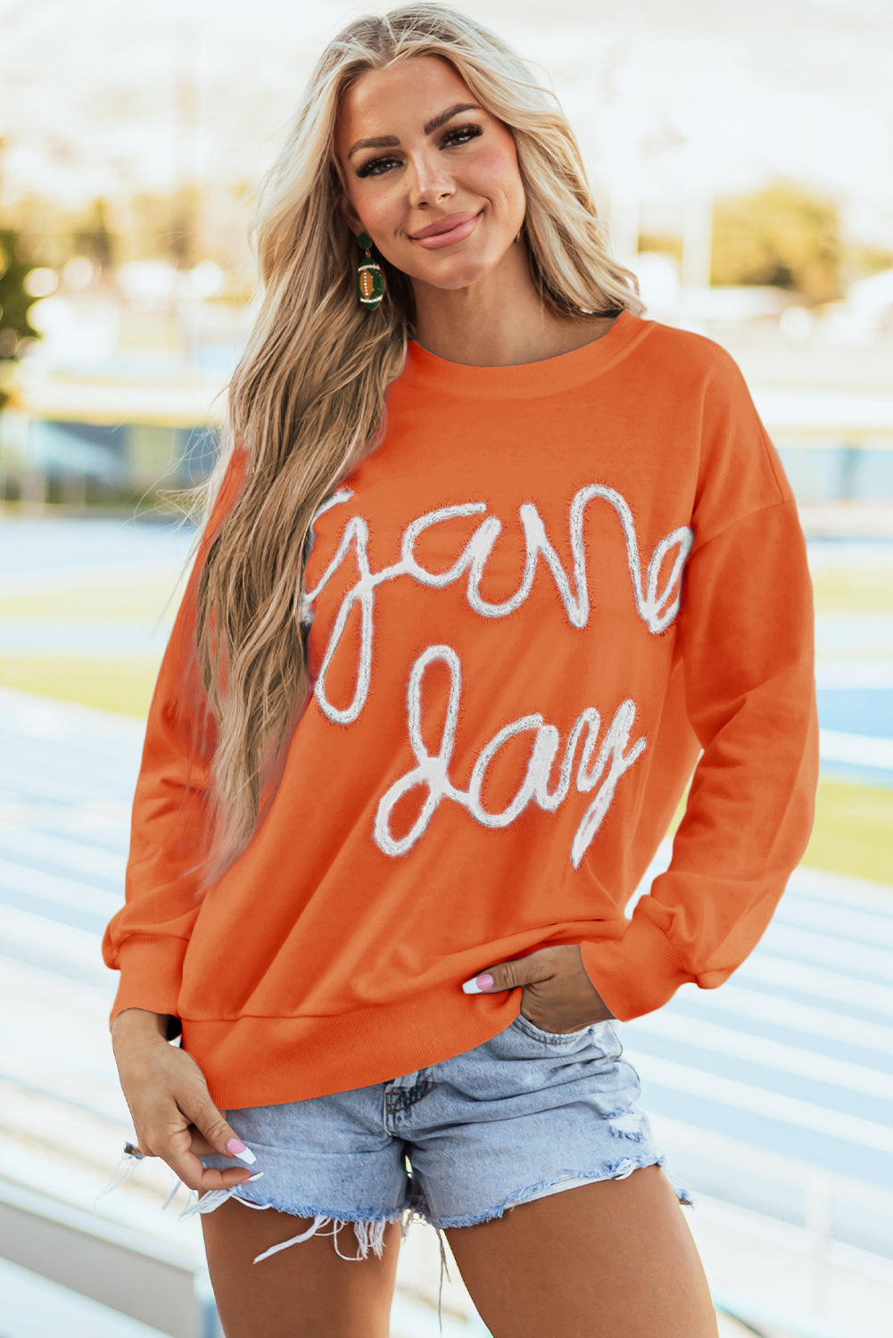 Tinsel Game Day - Sweat-shirt graphique a épaules tombantes