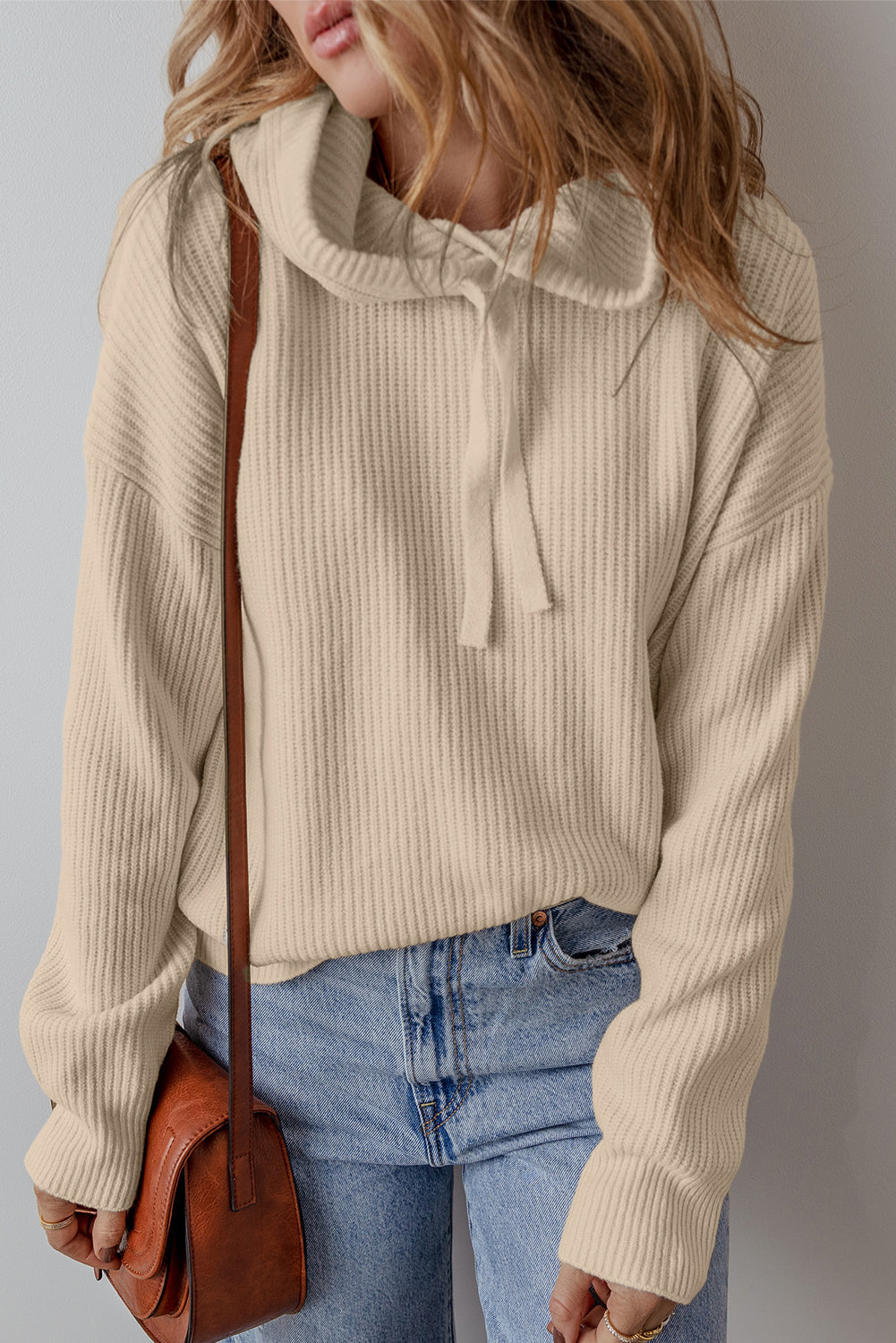 Pull a capuche avec cordon de serrage et épaules tombantes de couleur unie