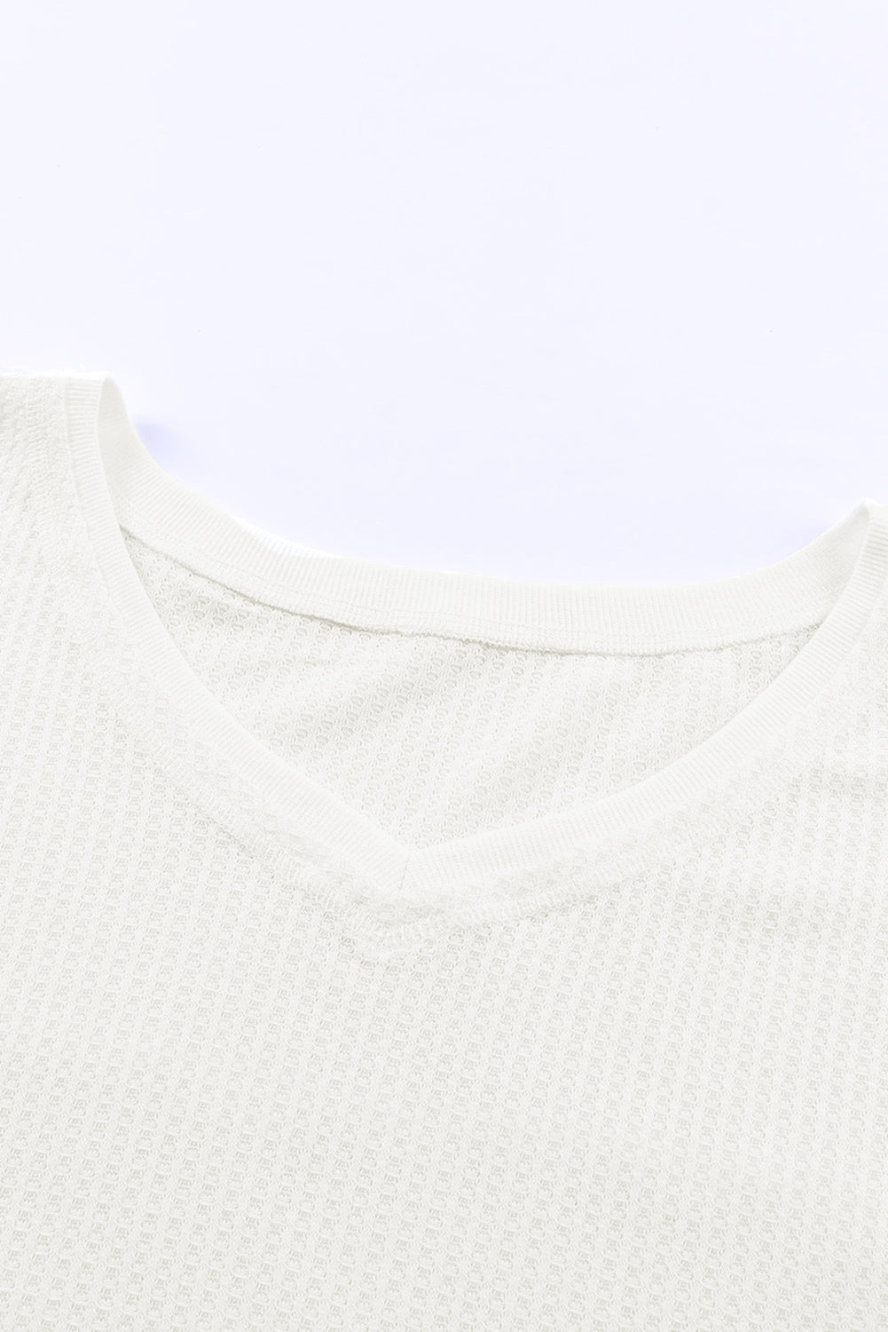Haut ample en tricot gaufré blanc à épaules tombantes