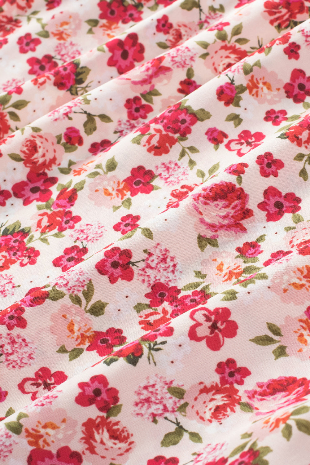 Haut sans manches à col montant et imprimé floral