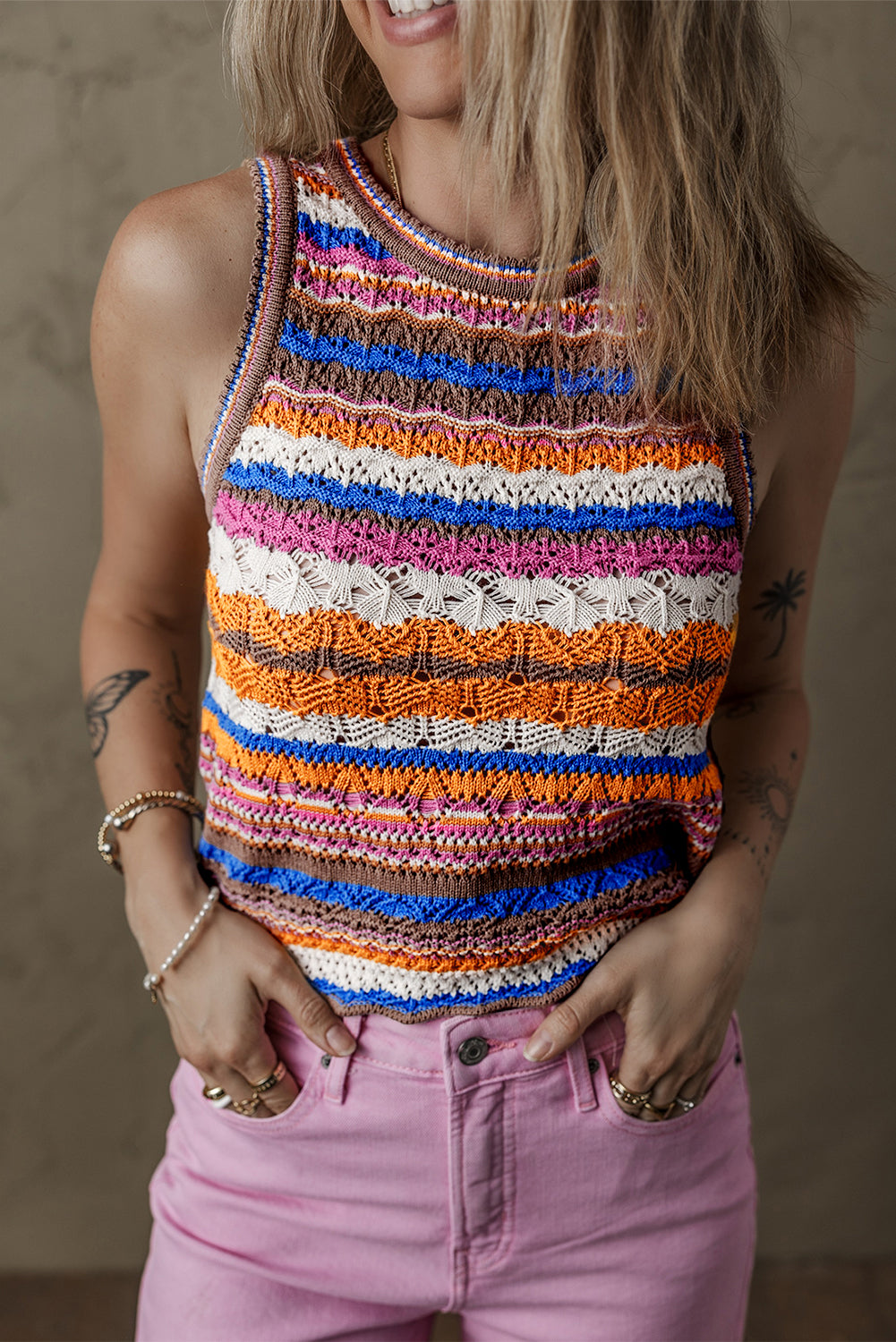 Gilet pull a col rond en tricot texturé rayé