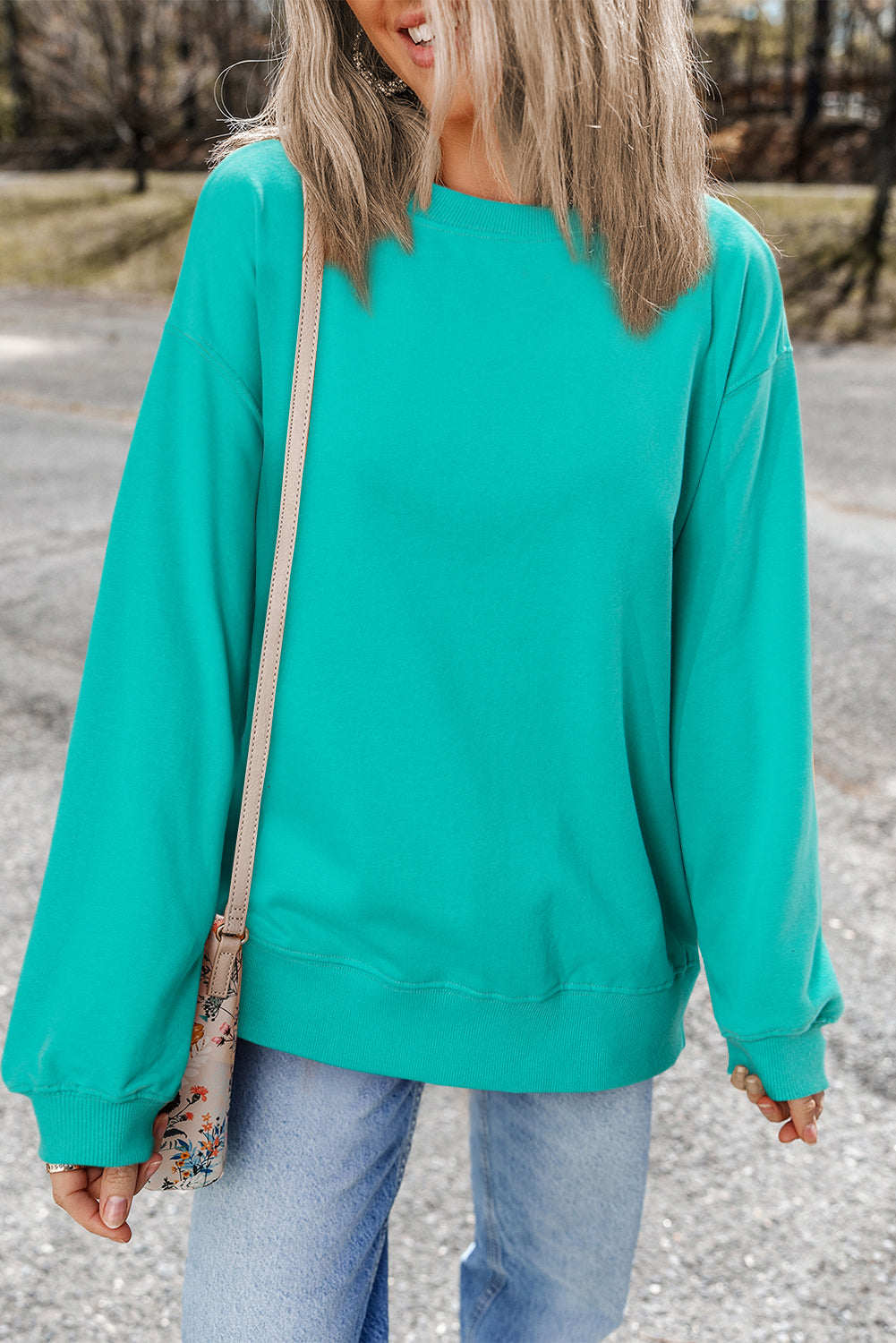 Sweat-shirt uni a col rond et épaules tombantes