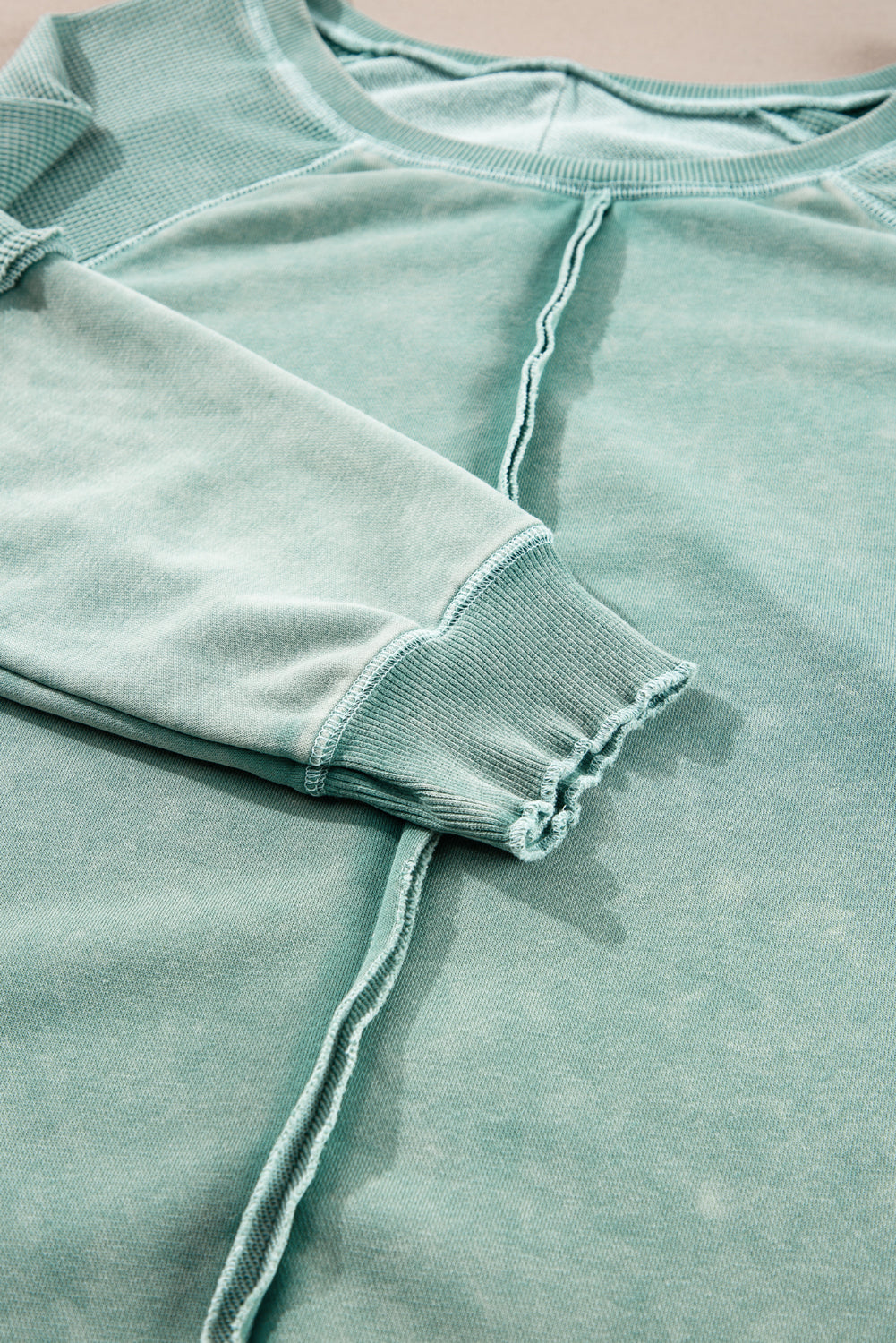 Sweat-shirt a manches raglan en tricot gaufré uni