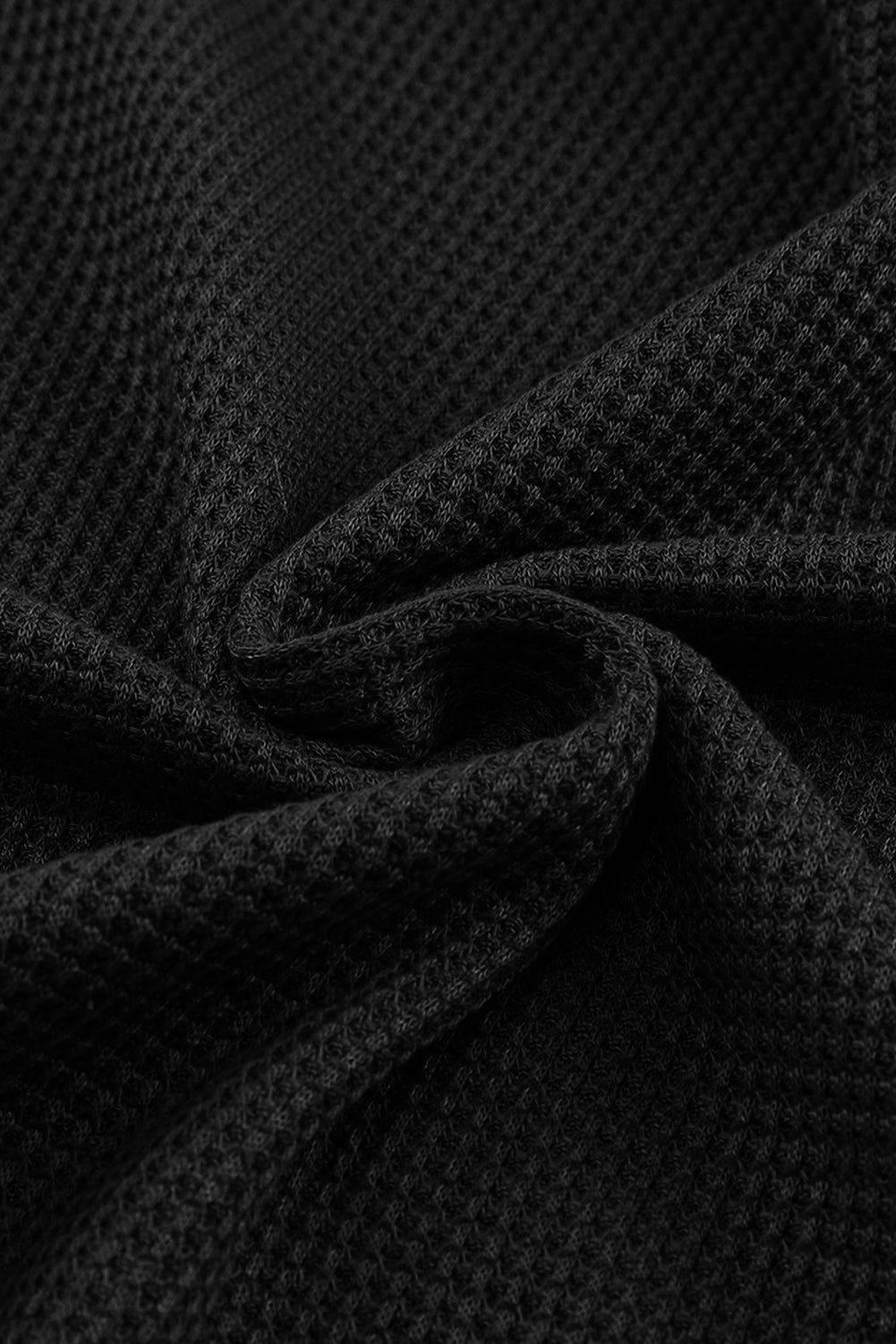 Haut texturé a manches longues et col rond