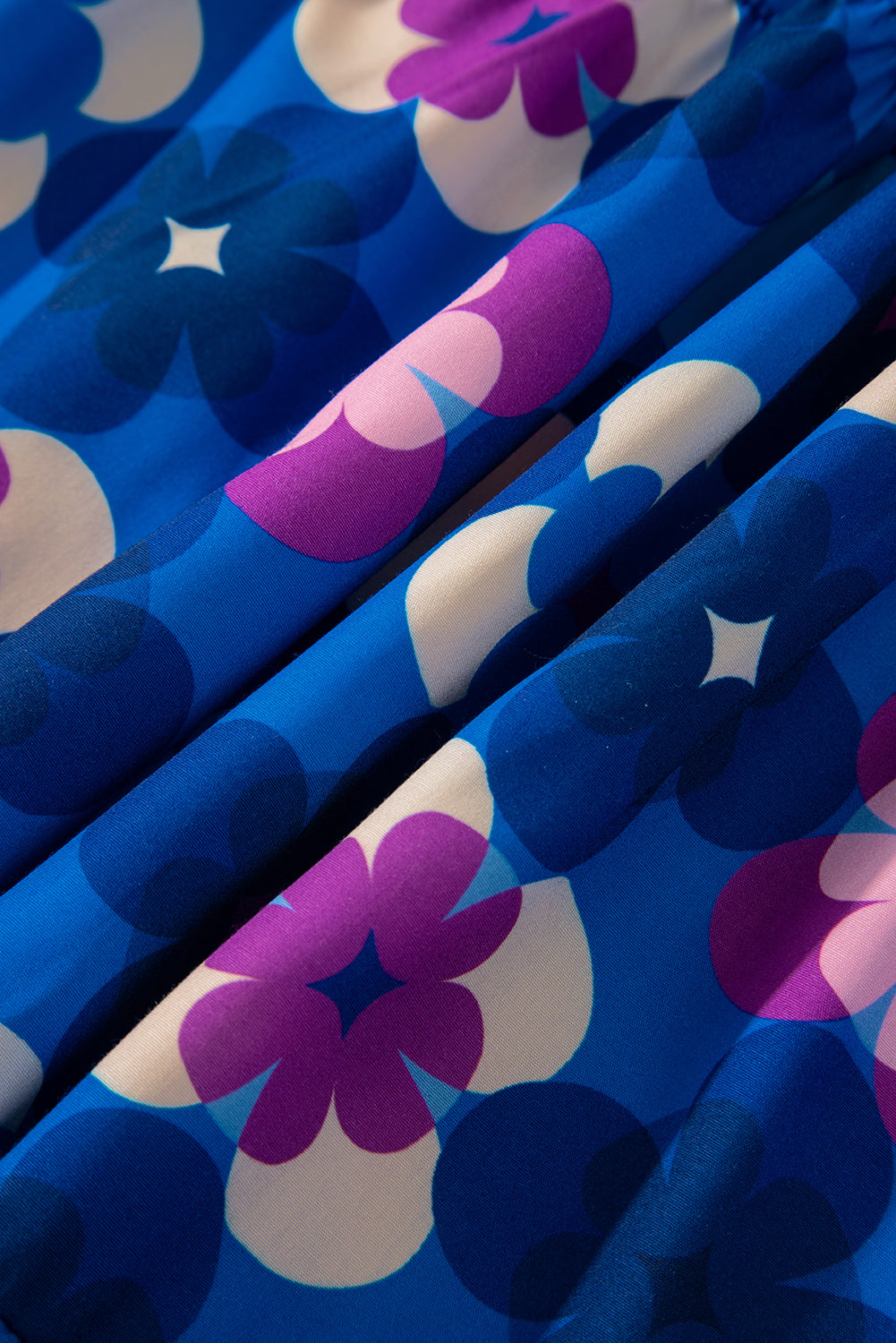 Robe mi-longue florale a volants et manches paysannes