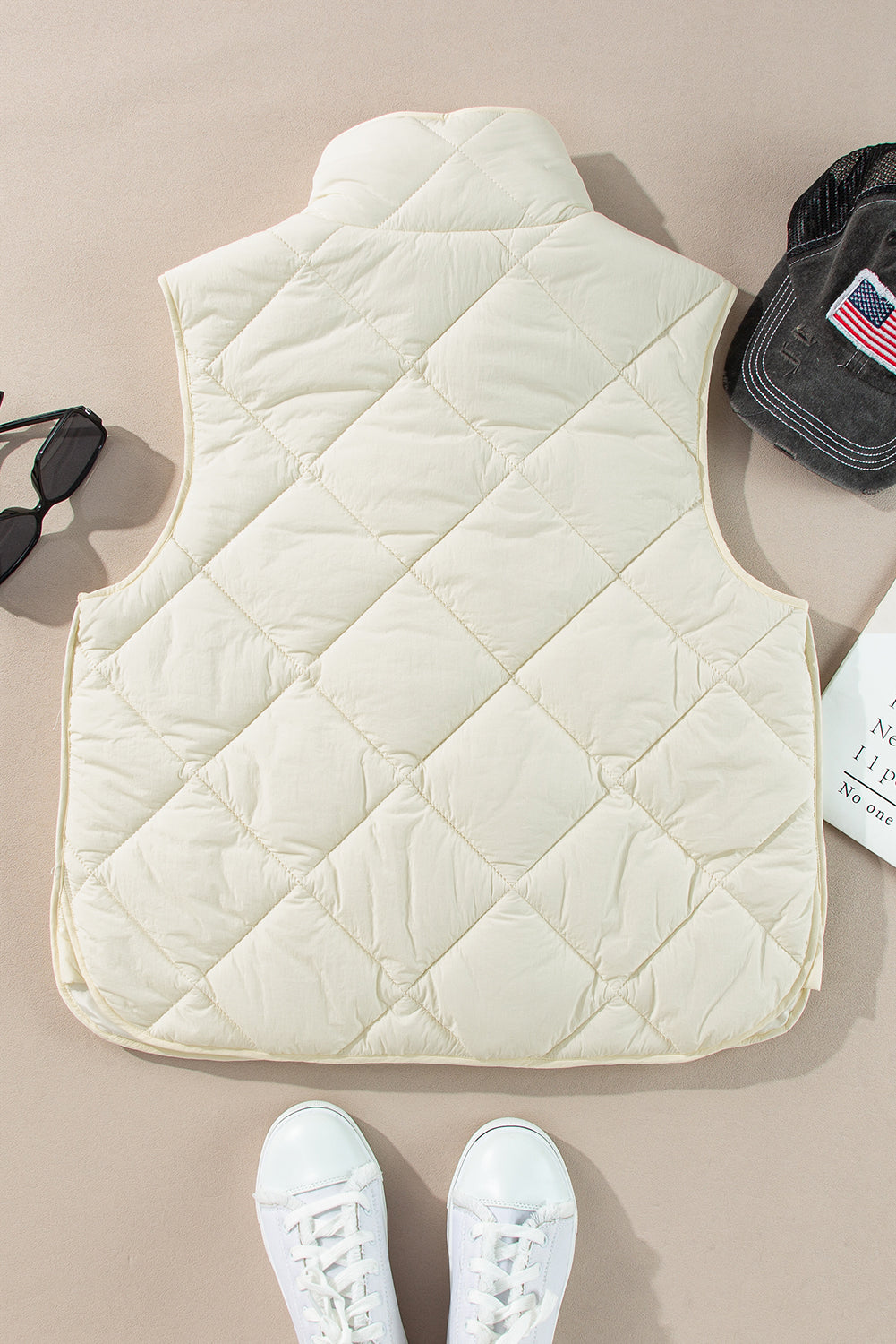 Manteau gilet matelassé a col haut et boutonné avec poche