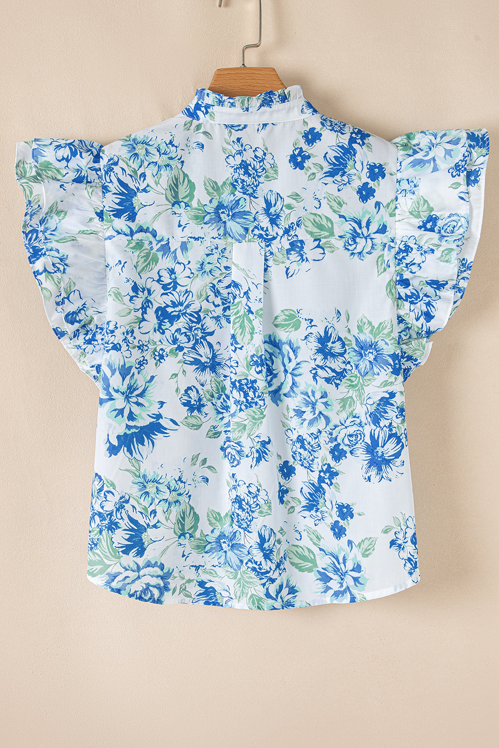 Chemise boutonnée à volants et manches à imprimé floral
