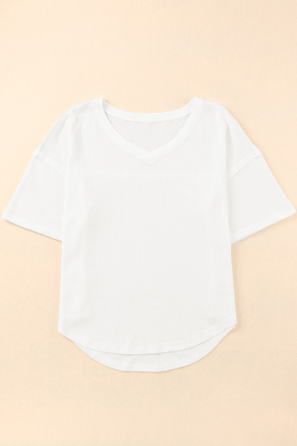 Haut ample en tricot gaufré blanc à épaules tombantes