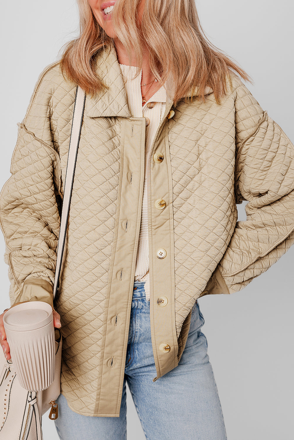 Veste matelassée boutonnée de couleur unie
