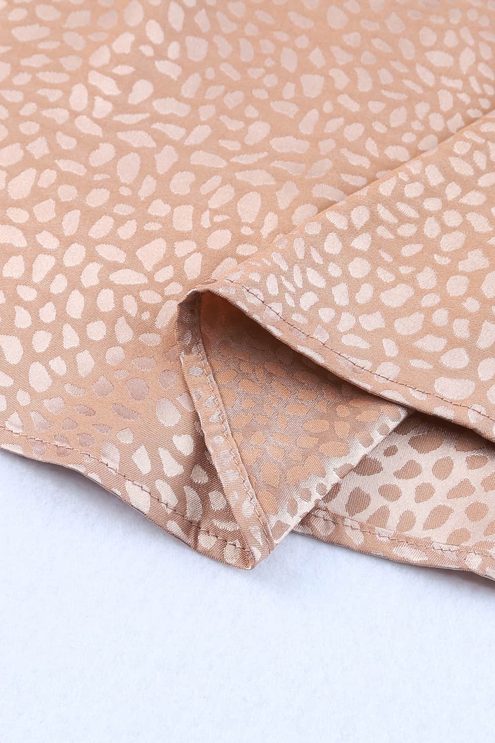 Débardeur léopard sans manches à col montant et lien