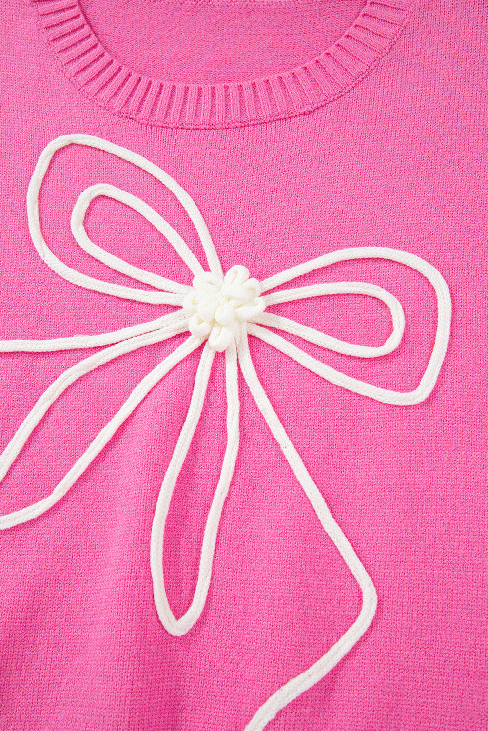 Pull décontracté à bordure côtelée et nœud fleuri