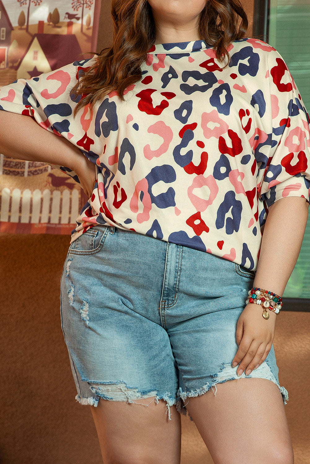 Blouse colorée à manches chauve-souris et imprimé léopard