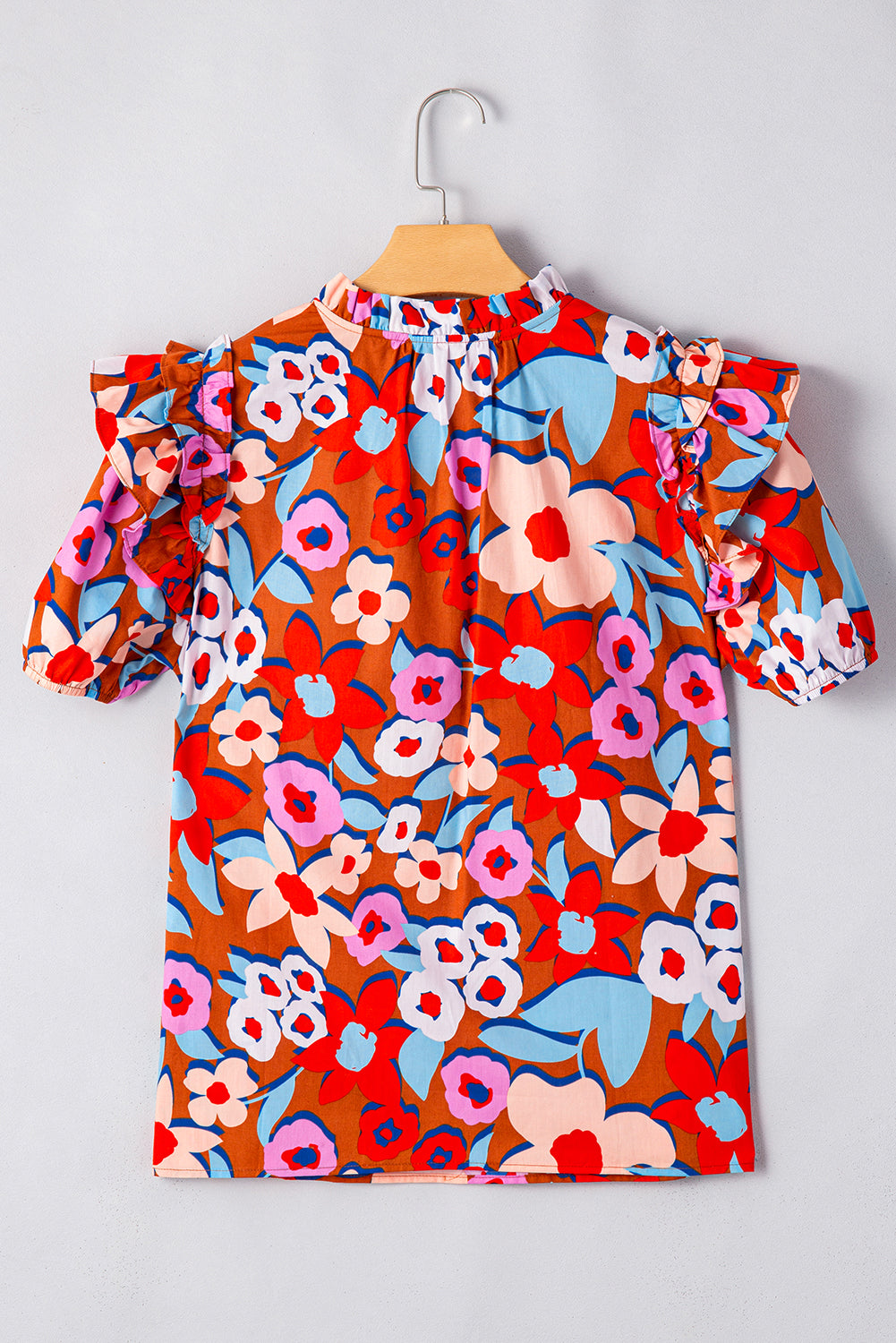 Chemisier à imprimé floral, col à volants et manches bouffantes