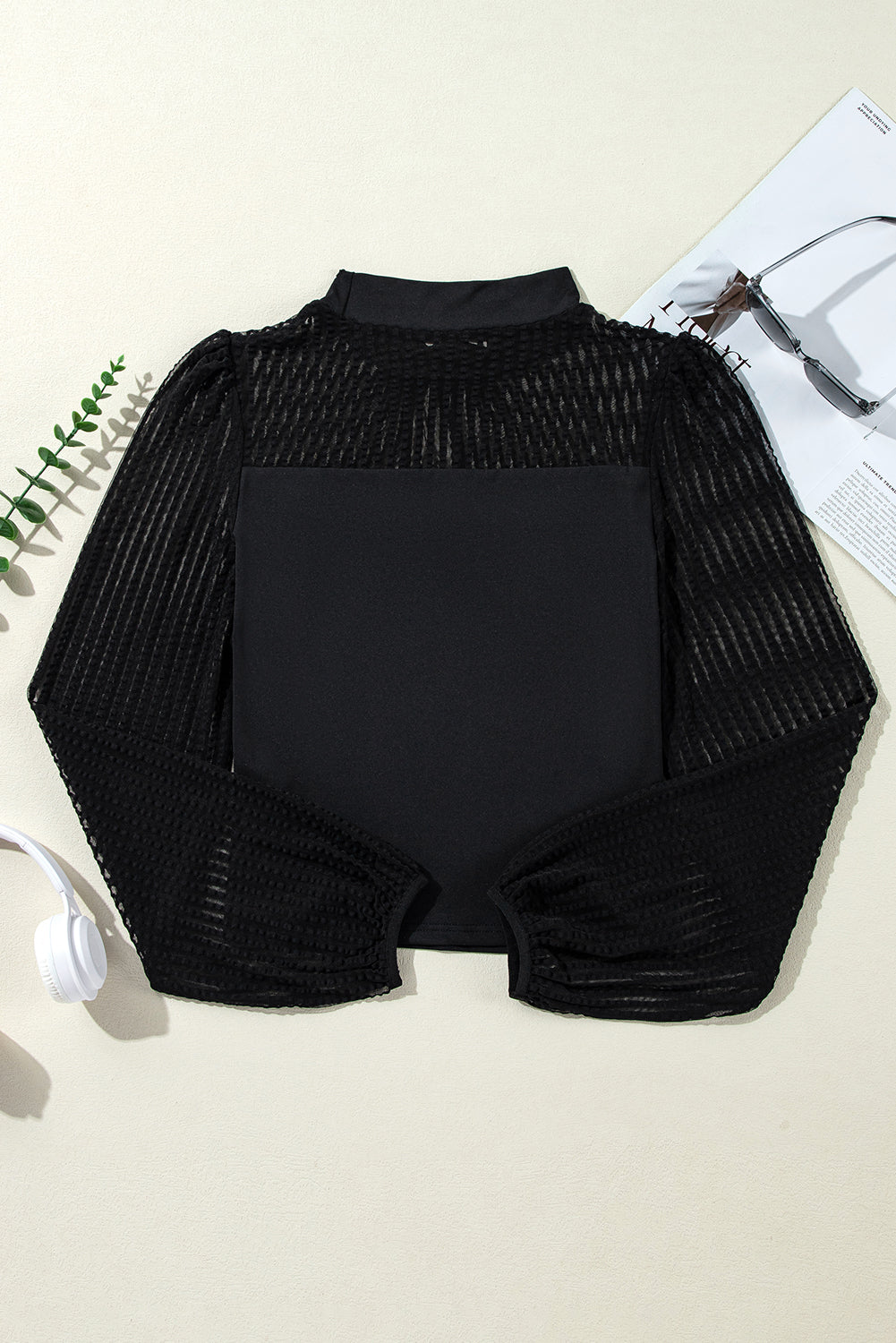 Blouse à manches lanternes en maille rayée à col montant