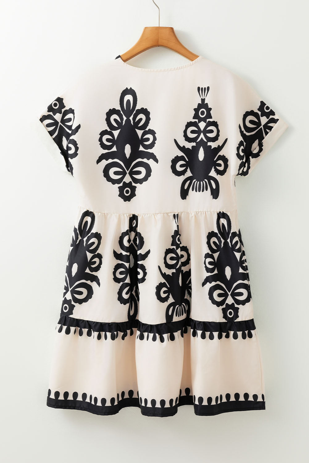 Robe à manches courtes et taille haute à imprimé vintage et col en V
