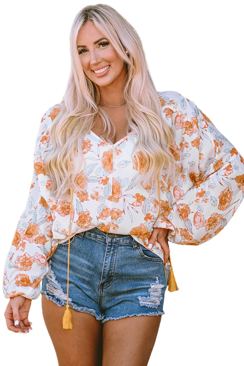 Blouse florale à manches bouffantes et col en V avec lien à pampilles