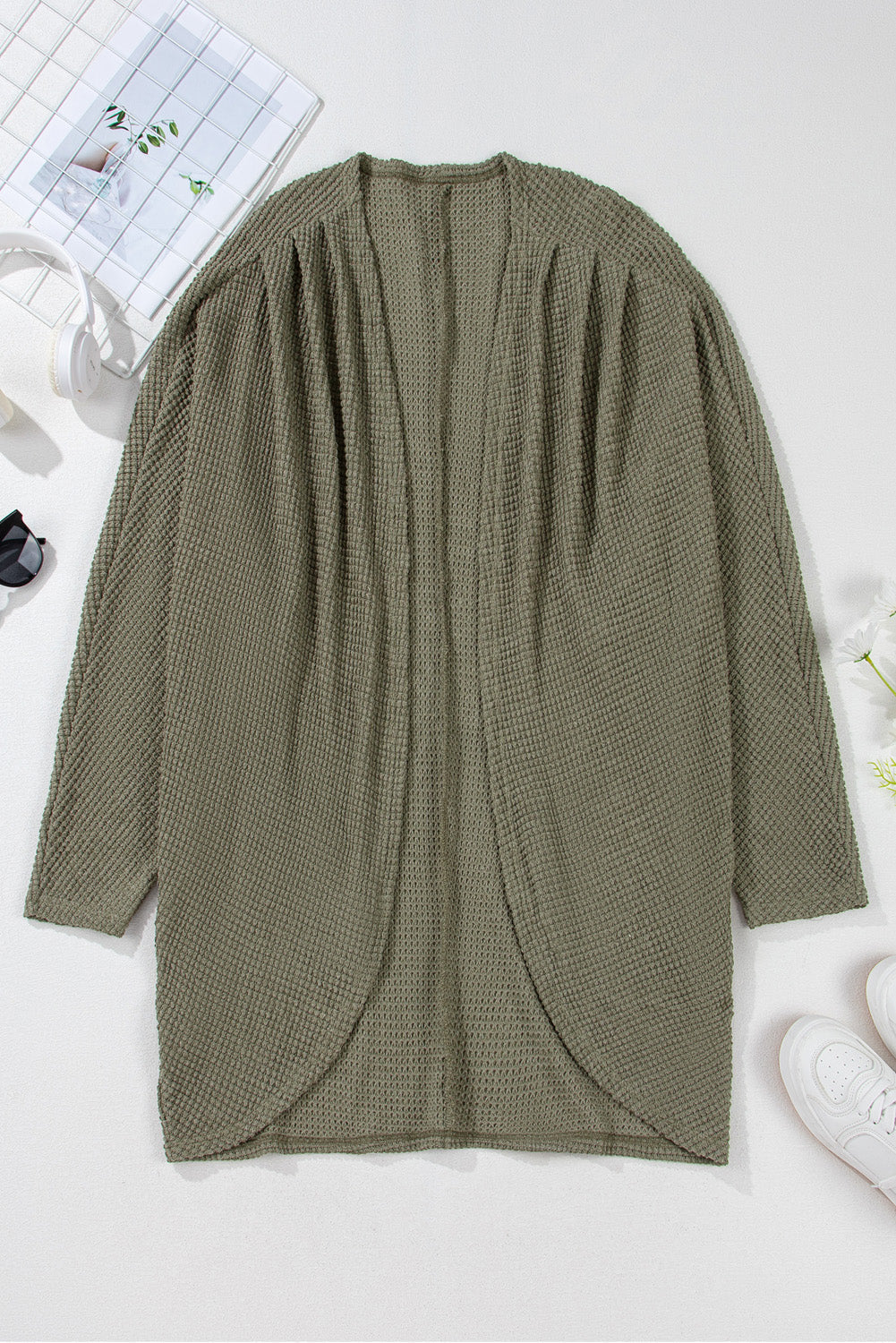 Cardigan grande taille en tricot gaufré a épaules tombantes ouvert sur le devant avec poche