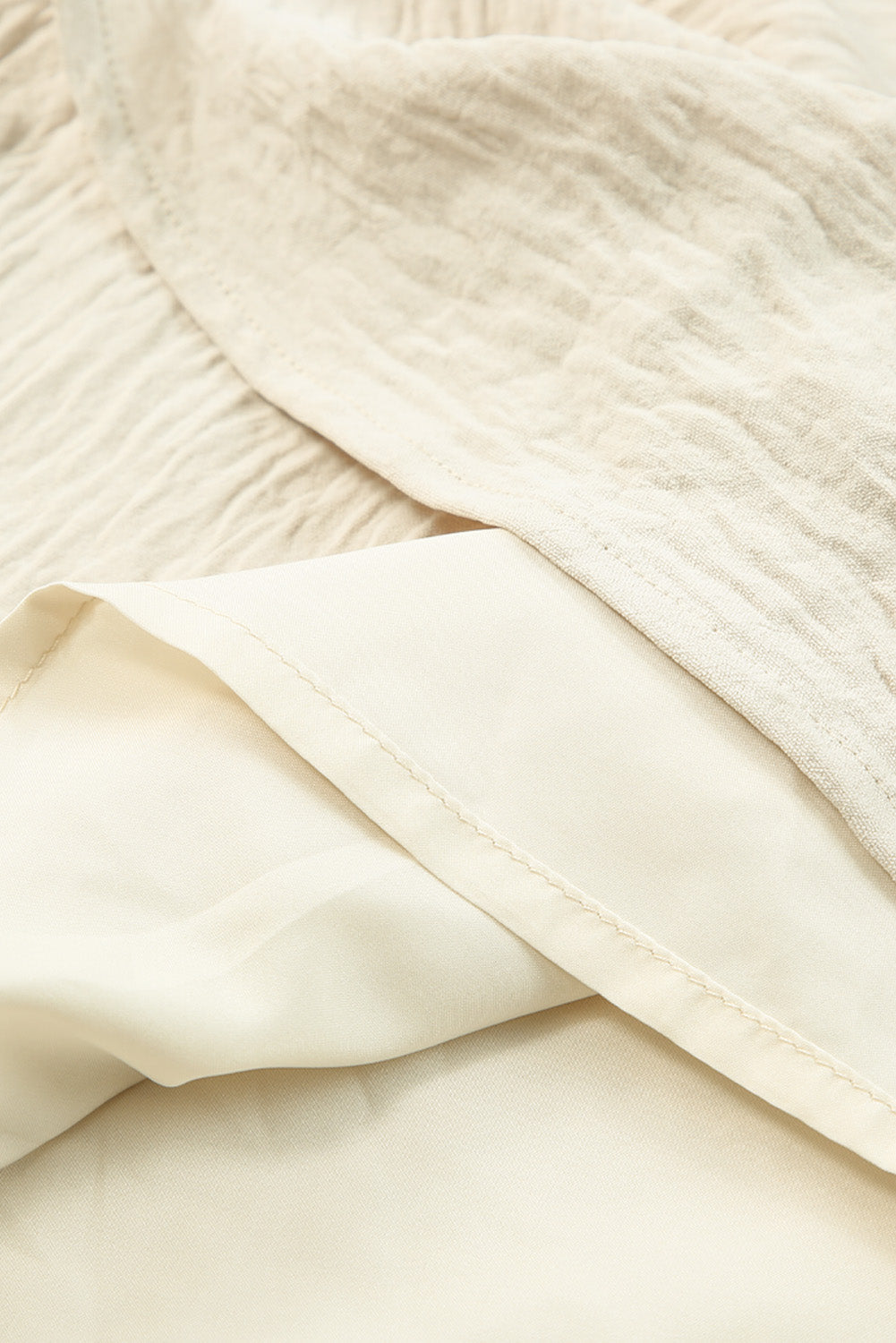 Robe longue sans manches à col en V avec ceinture élastique