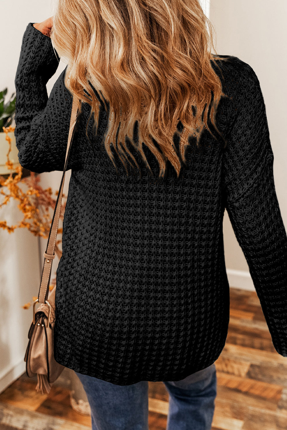 Pull à col en V au crochet évidé