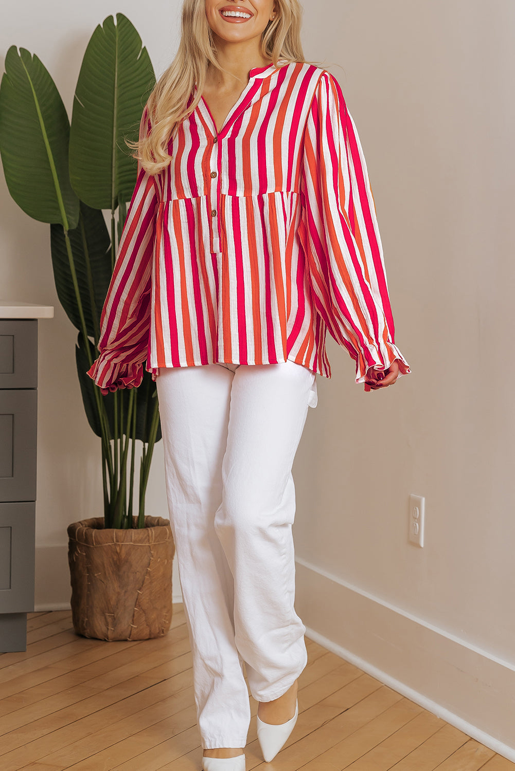 Blouse boutonnée sur le devant a col en V cranté et manches ballon