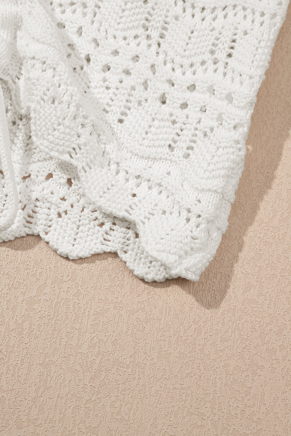 Gilet pull tendance en tricot creux avec col en V et cordon de serrage