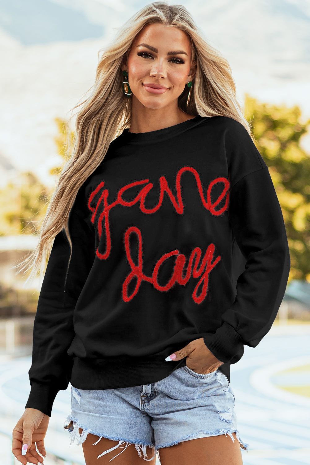 Tinsel Game Day - Sweat-shirt graphique a épaules tombantes
