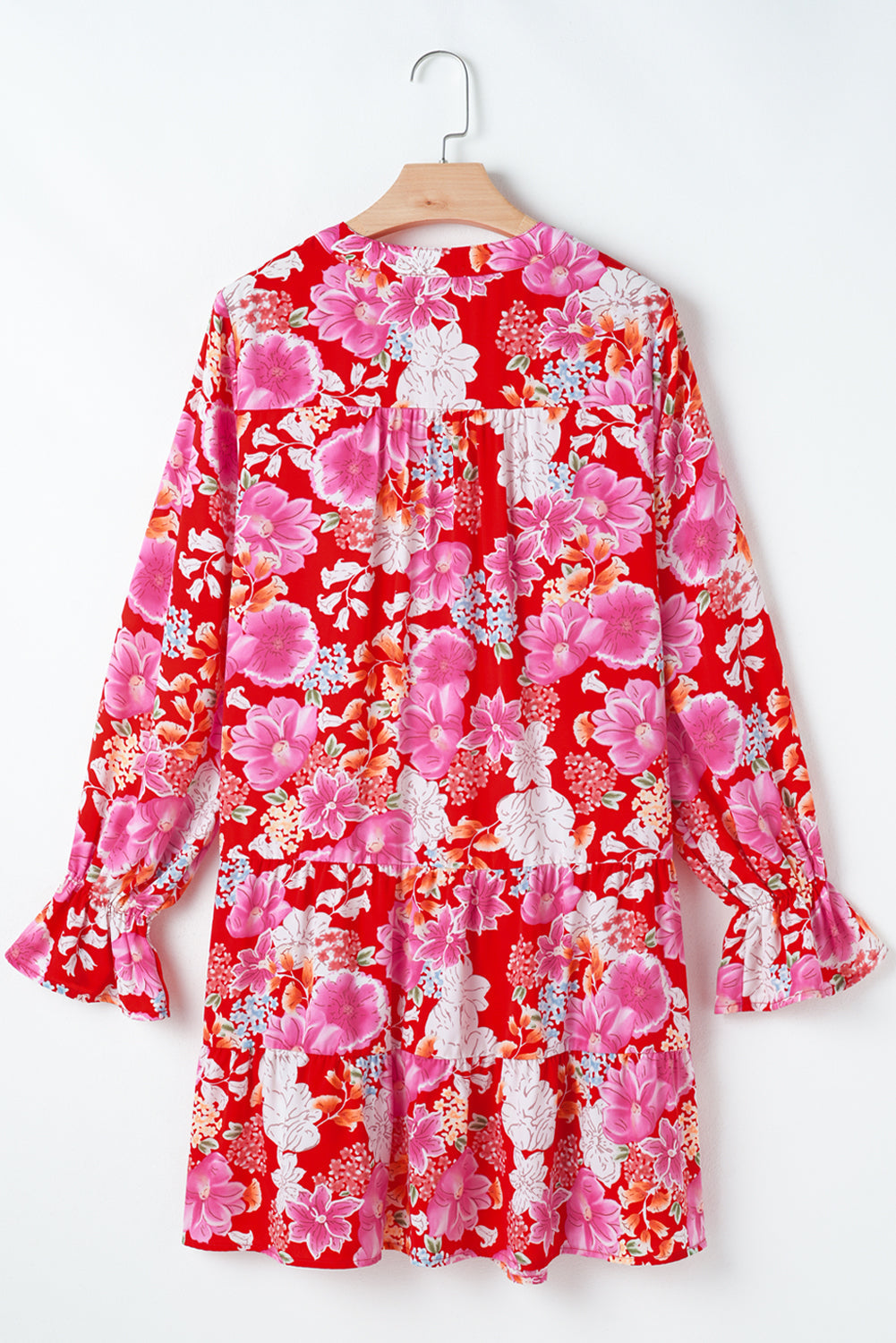 Mini-robe babydoll taille haute a imprimé floral et col en V