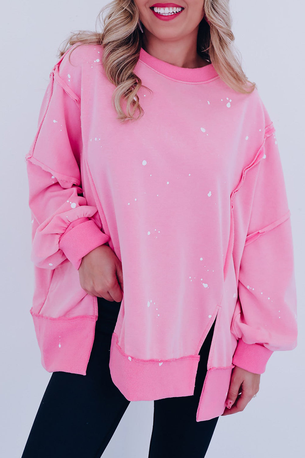 Sweat ample à coutures exposées et taches d'éclaboussures