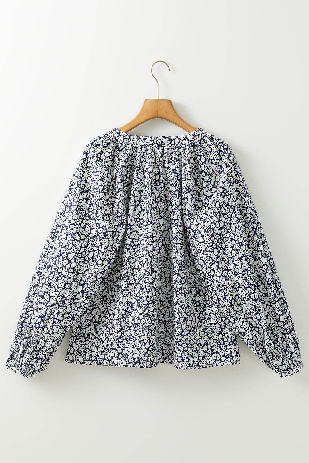 Blouse a manches bouffantes et col en V cranté a imprimé floral