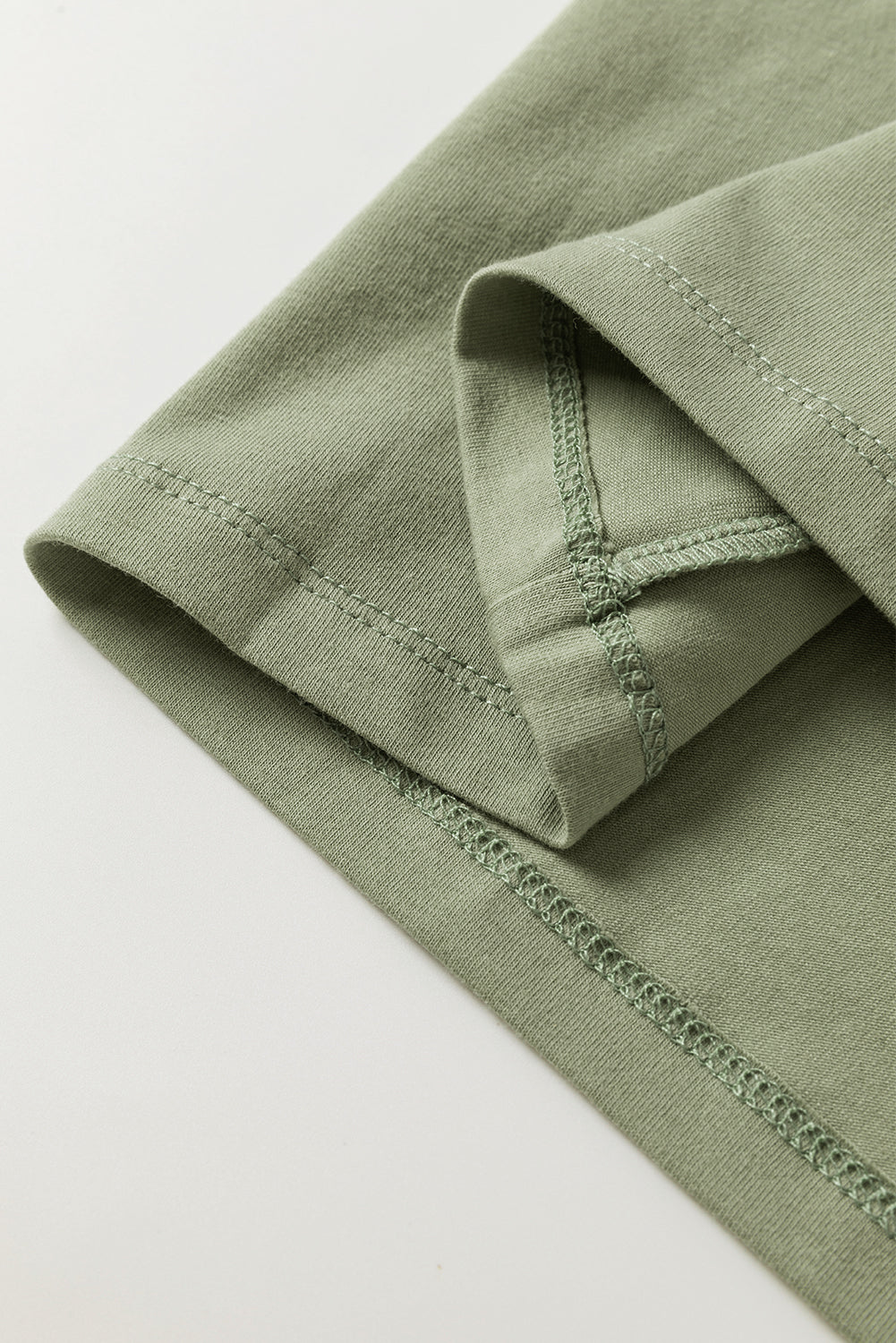 Haut ajusté a manches longues et col en V avec boutons