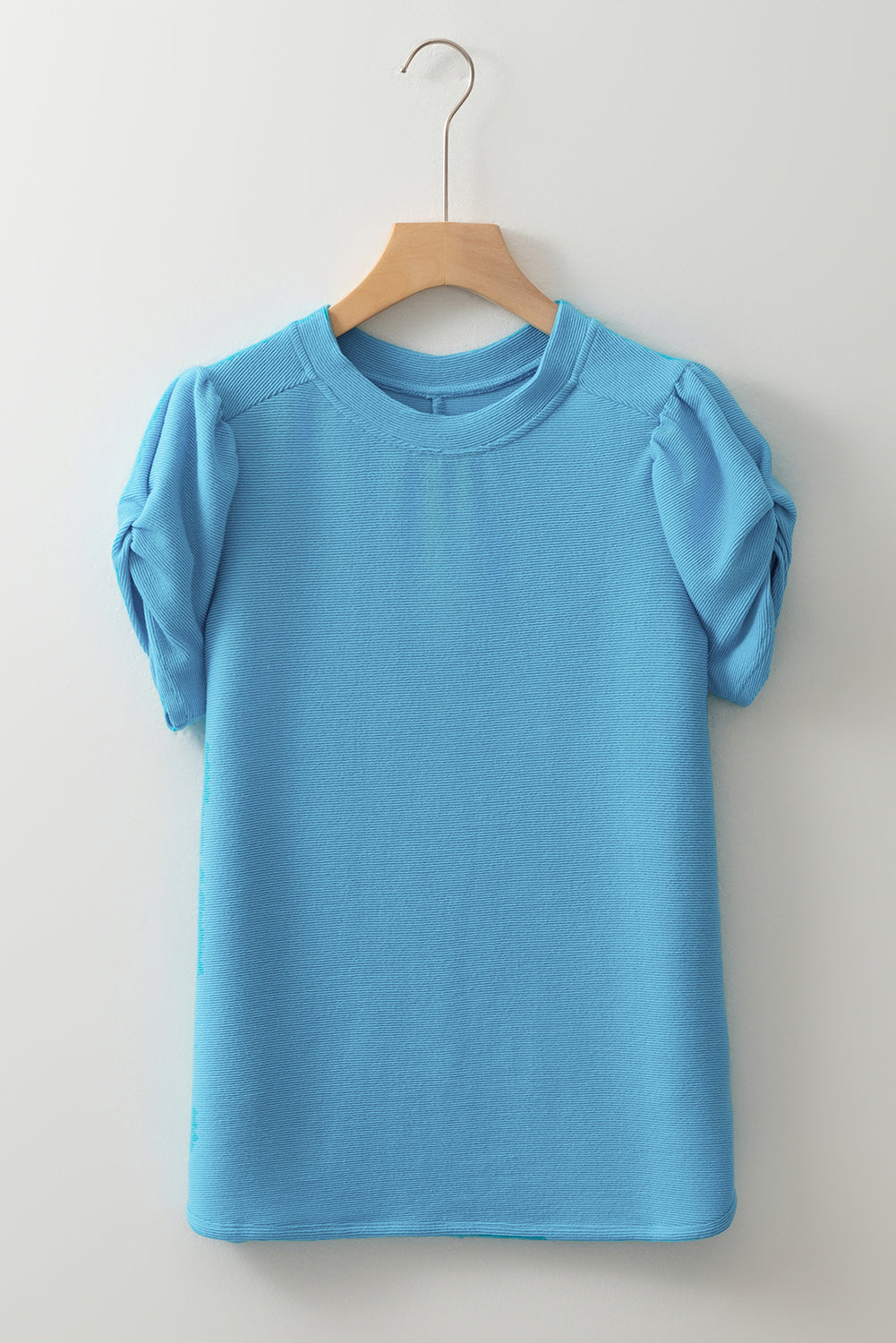 T-shirt élégant à manches bouffantes de couleur unie