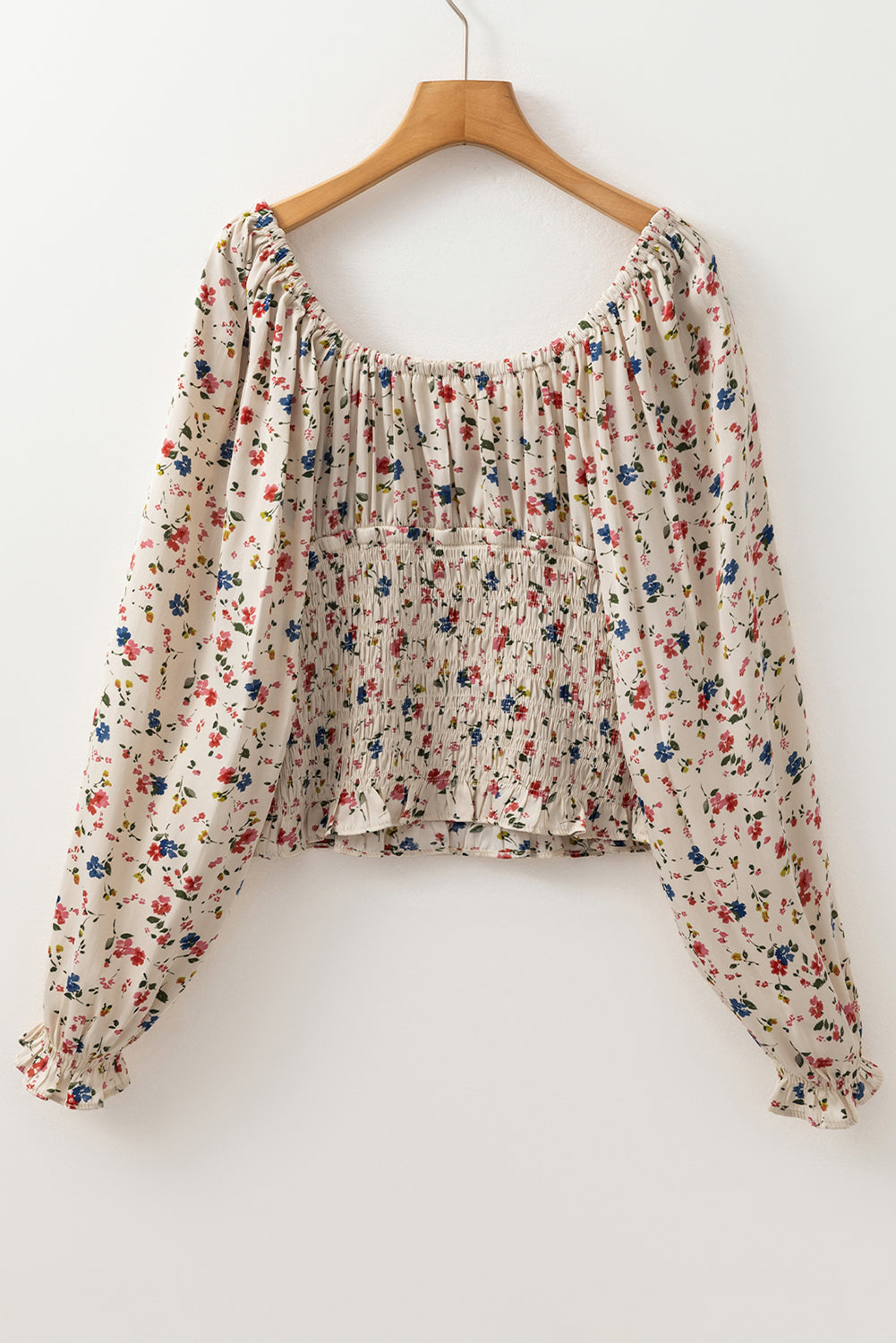 Chemisier bohème a imprimé floral et taille smockée, col en V