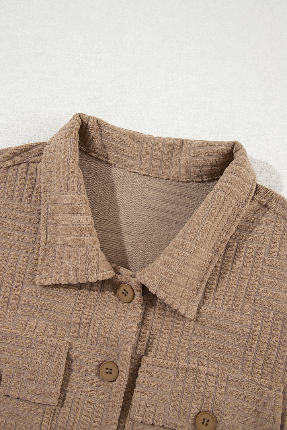 Veste boutonnée texturée avec poche poitrine
