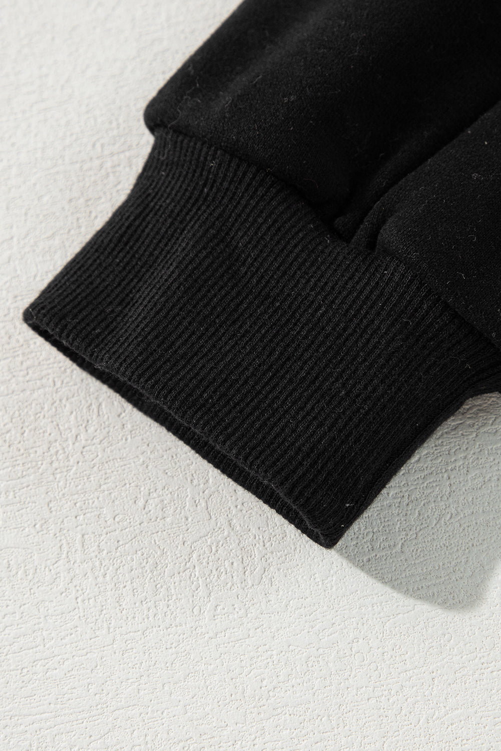 Sweat-shirt à épaules tombantes en patchwork bicolore