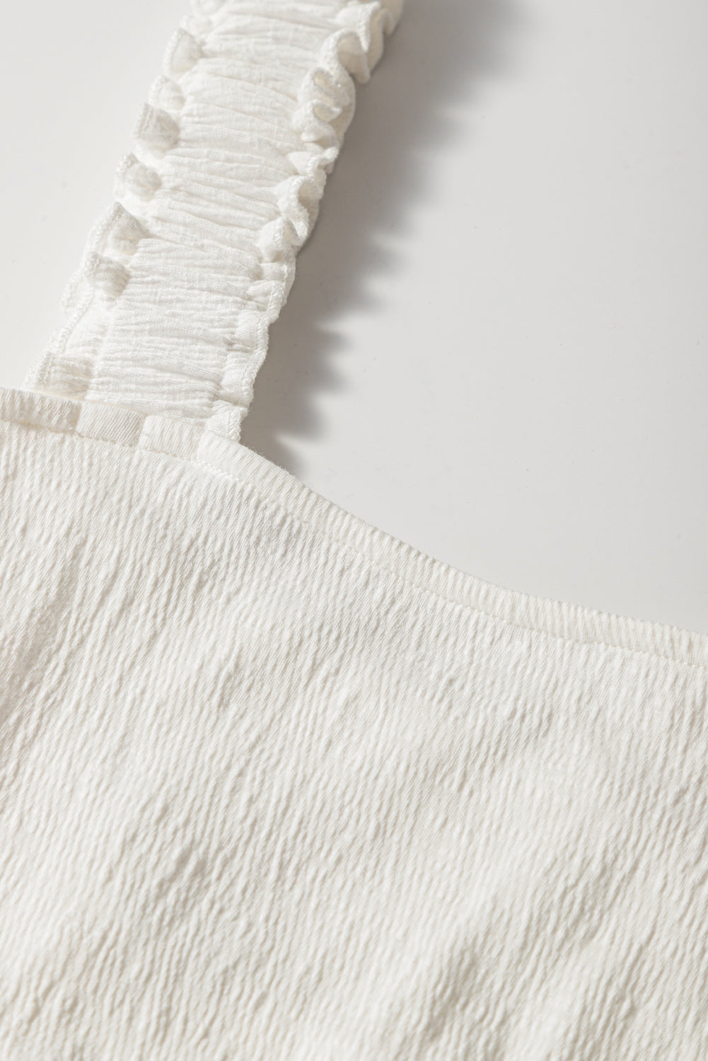 Débardeur babydoll à bretelles froissées et volantées