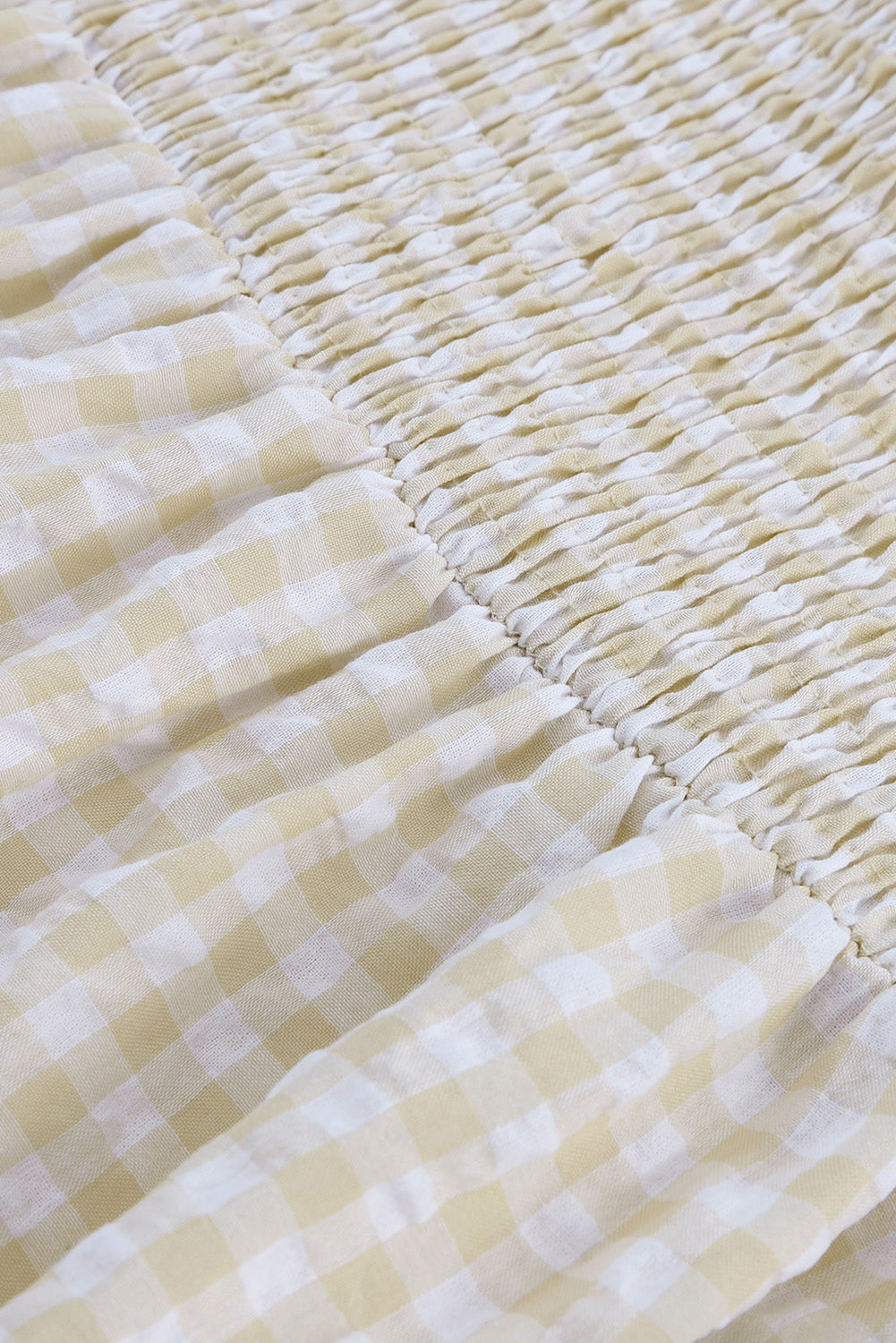 Robe longue smockée à carreaux et manches à volants