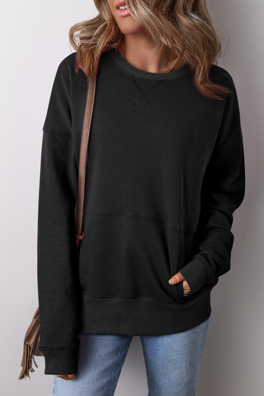 Sweat-shirt ample avec poches et coutures croisées a épaules tombantes