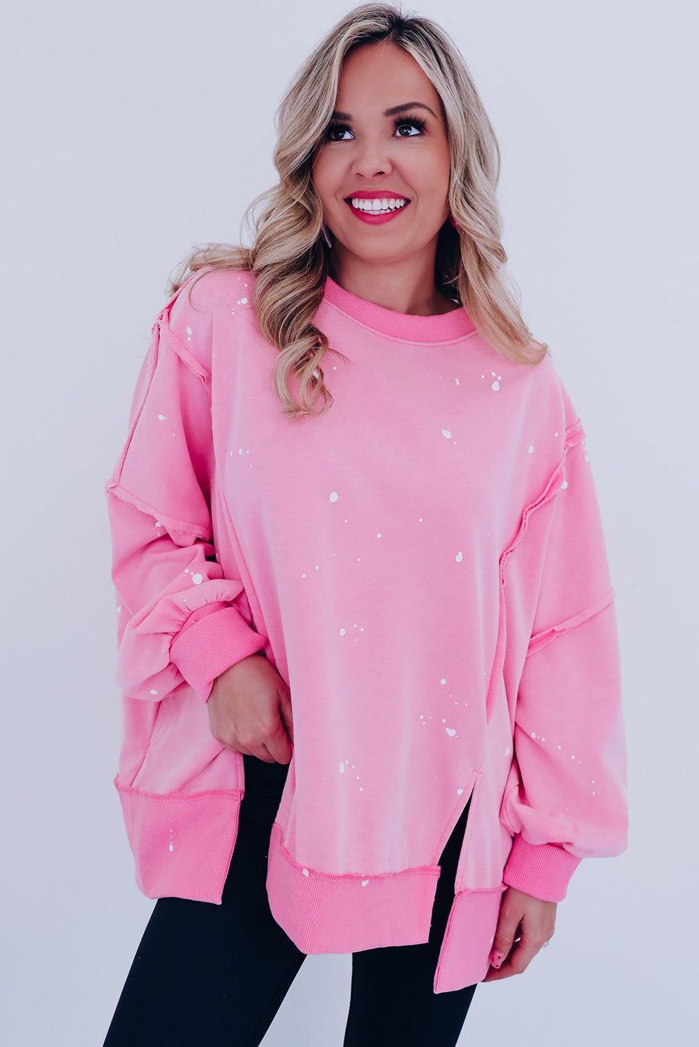 Sweat ample à coutures exposées et taches d'éclaboussures