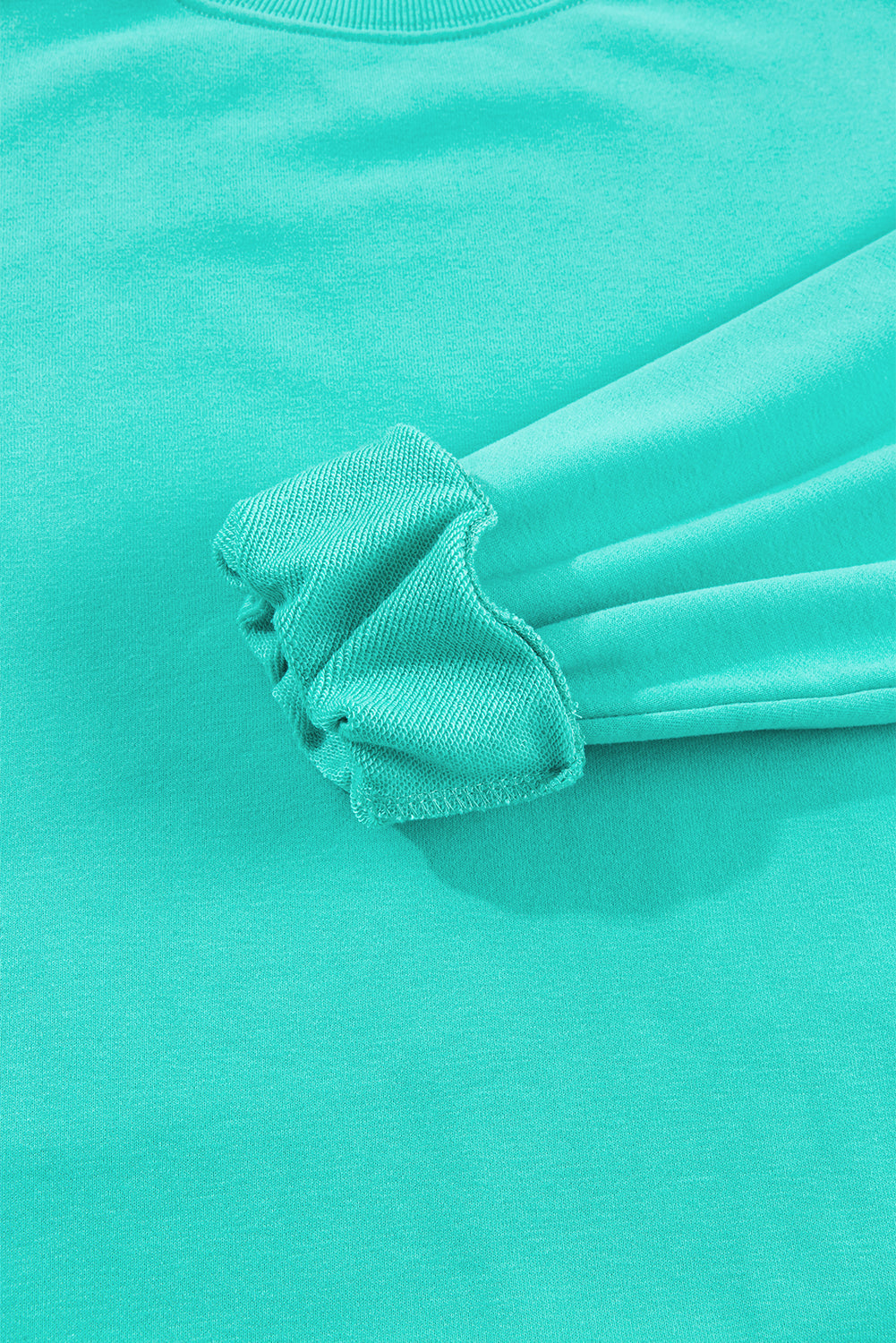 Sweat-shirt uni a col rond et épaules tombantes