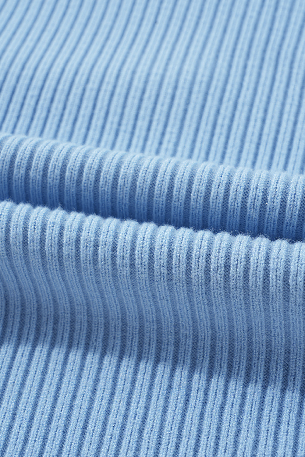 Pull a manches courtes en tricot côtelé avec poche plaquée
