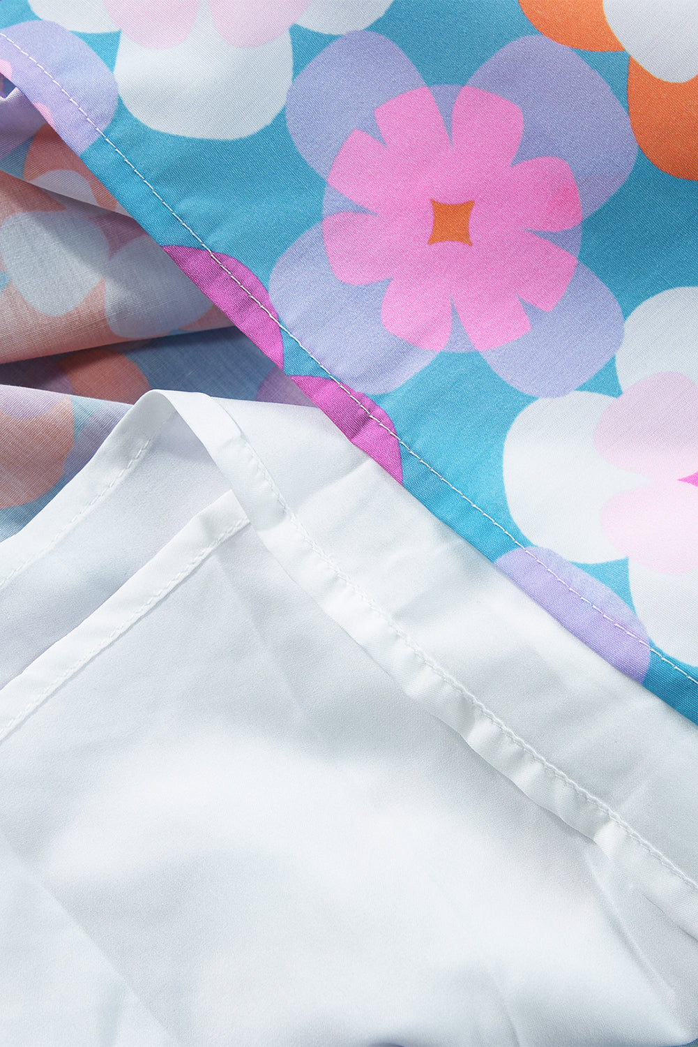 Robe longue a volants et imprimé floral, sans manches, a volants