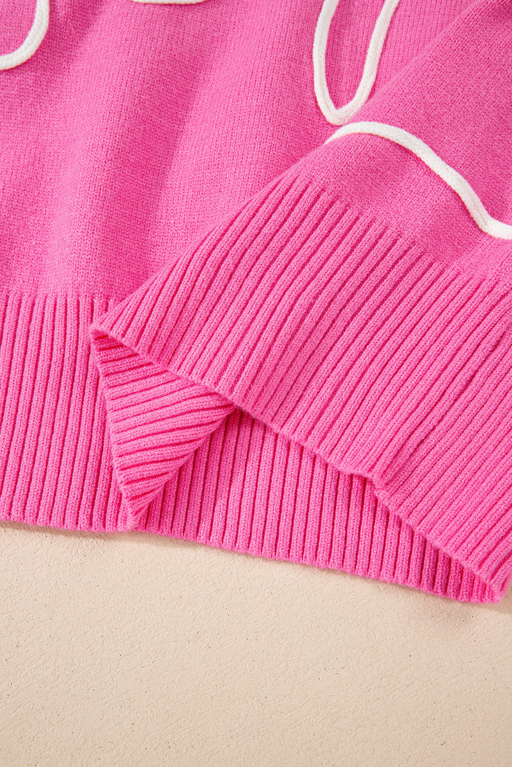Pull décontracté à bordure côtelée et nœud fleuri