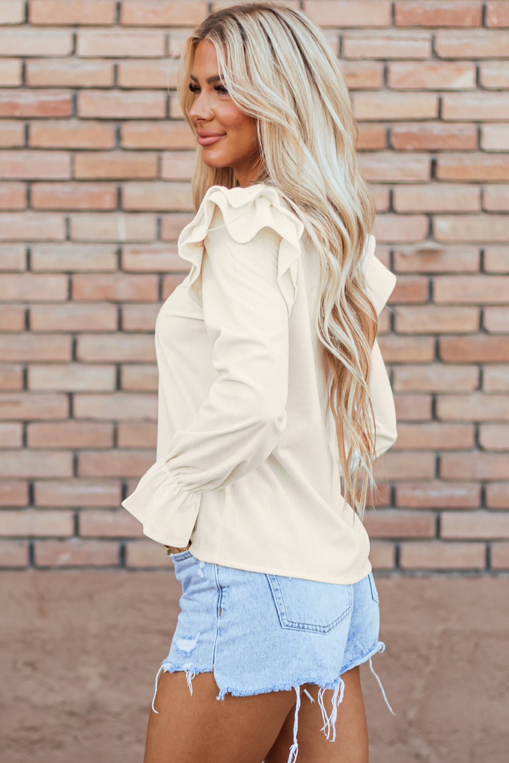 Blouse en velours côtelé à manches volantées