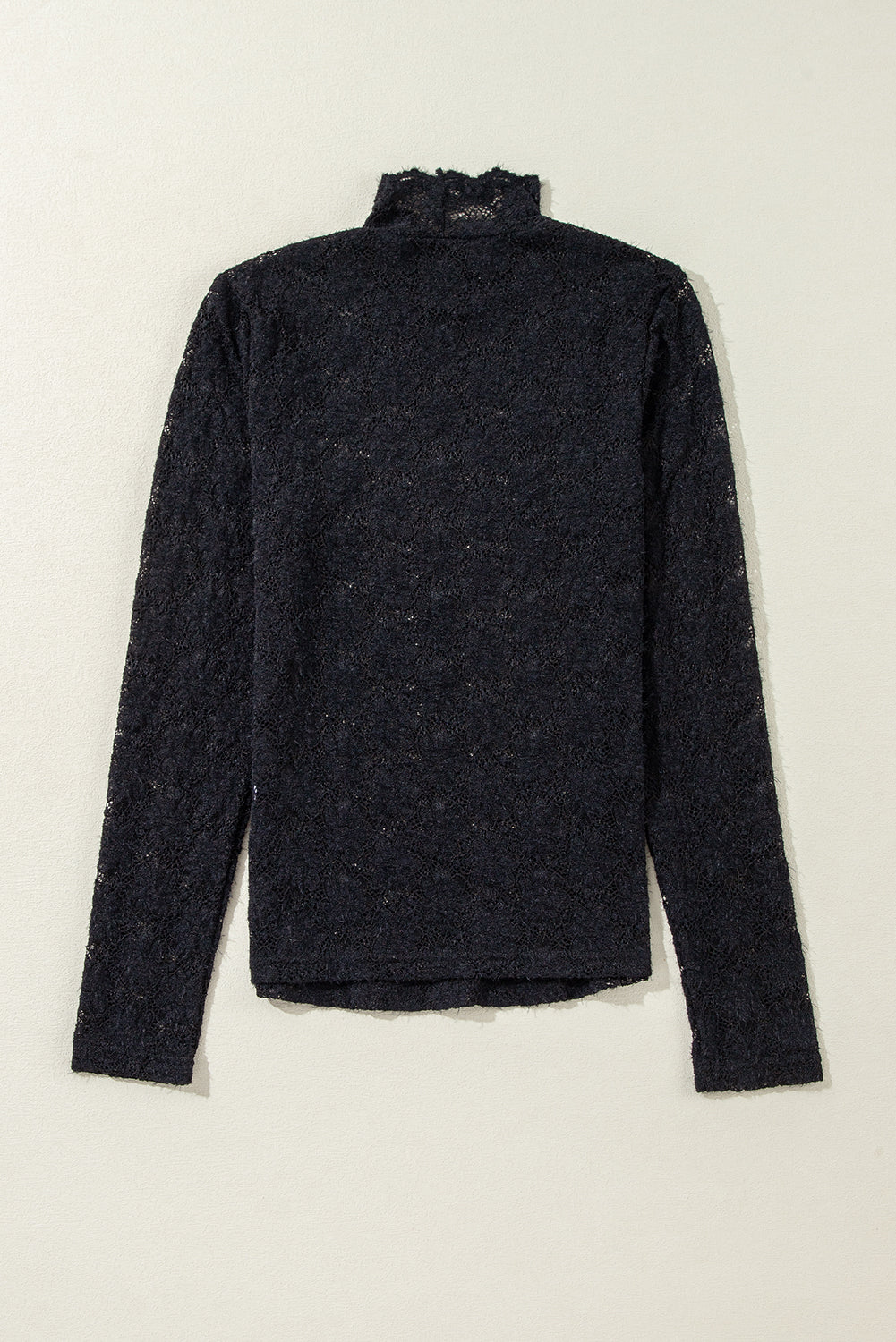 Haut a manches longues et col montant en dentelle florale