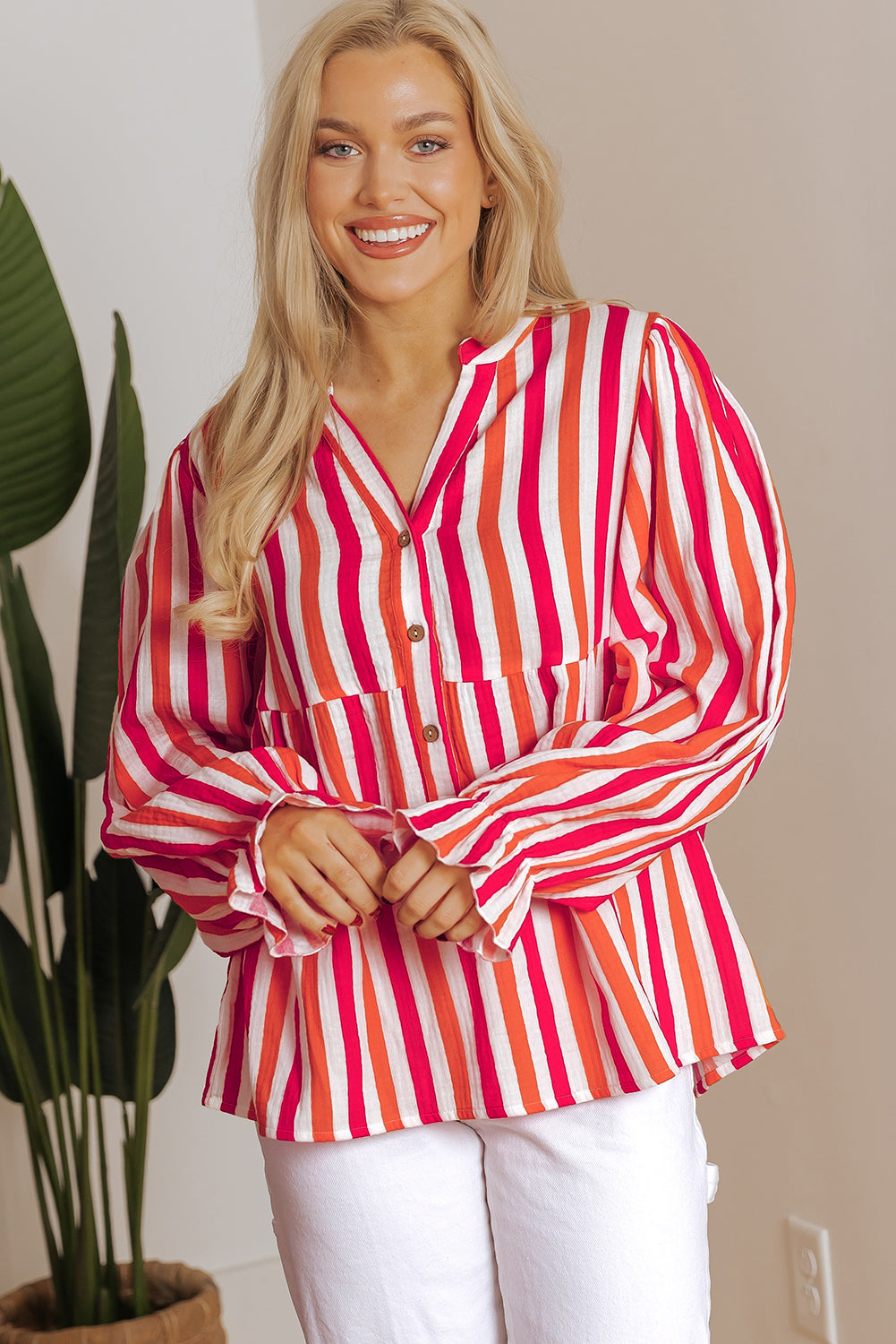 Blouse boutonnée sur le devant a col en V cranté et manches ballon