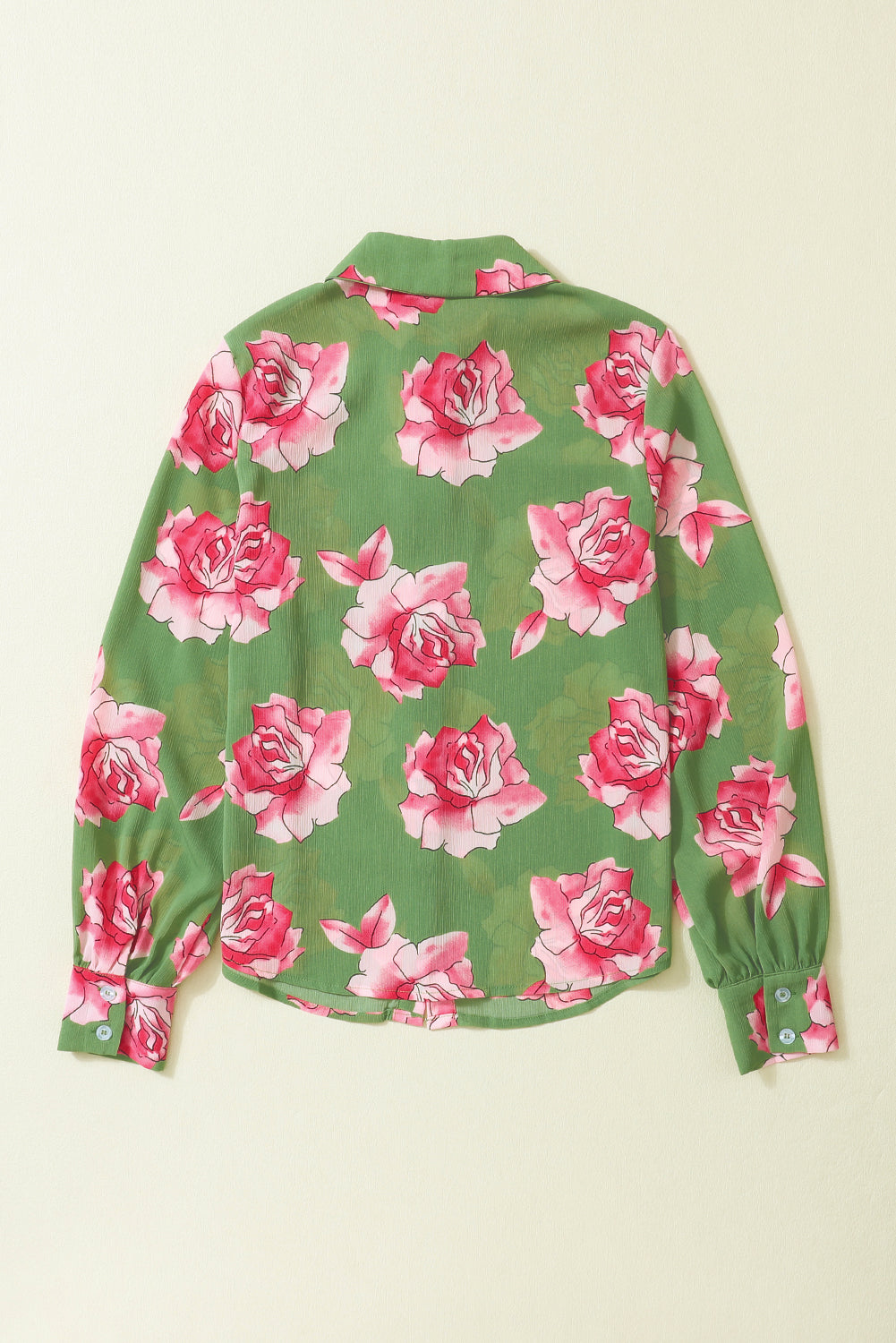 Chemise à manches bouffantes et détails plissés à imprimé floral