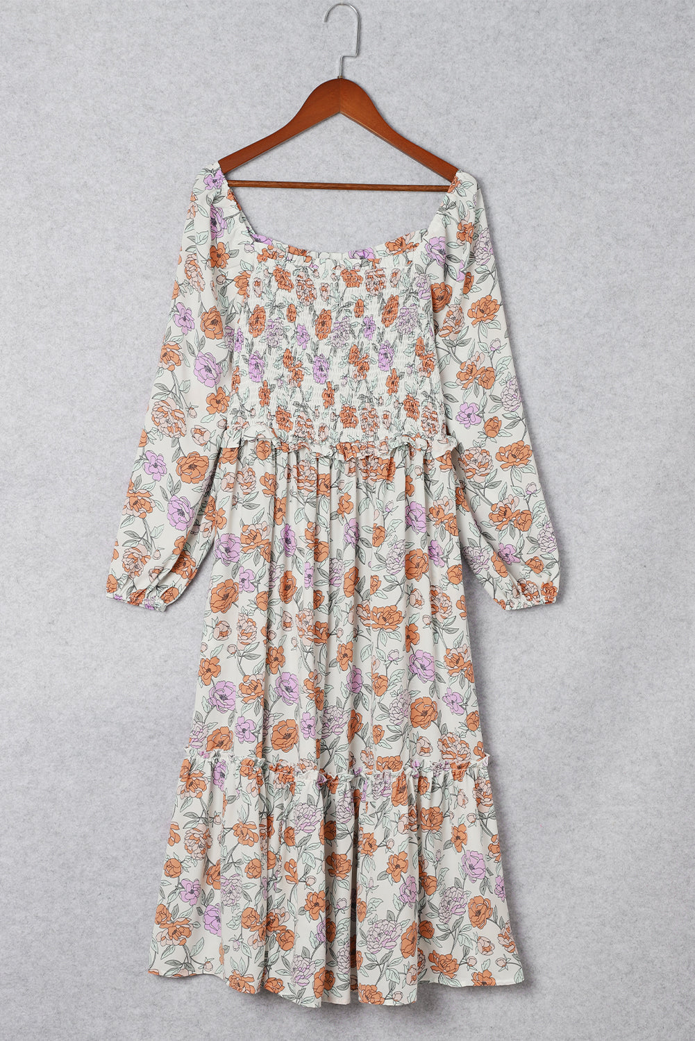 Robe fleurie smockée a manches longues et poches