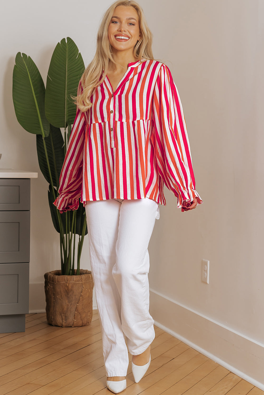 Blouse boutonnée sur le devant a col en V cranté et manches ballon