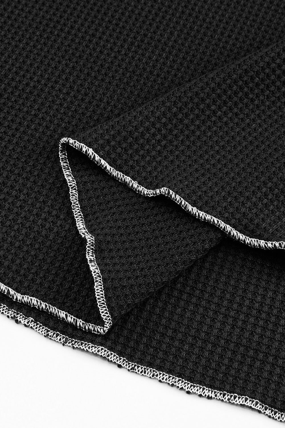 Haut texturé a manches longues et col rond