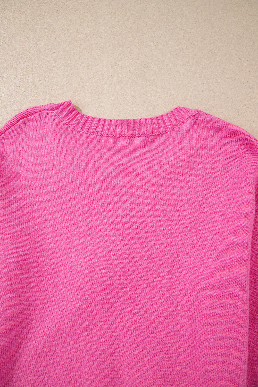 Pull décontracté à bordure côtelée et nœud fleuri